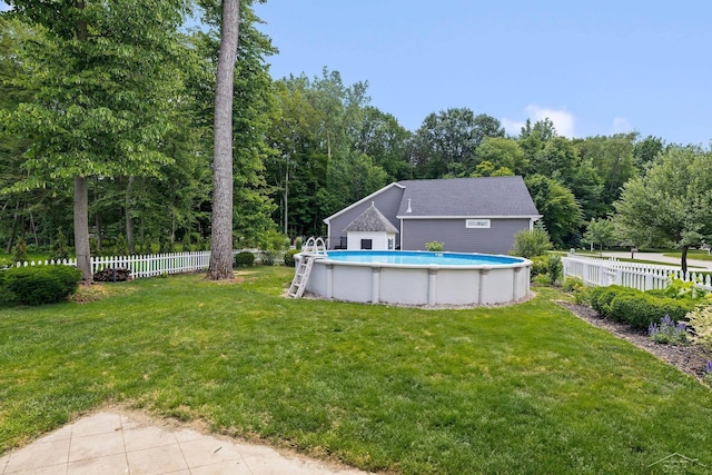 12449 Northway Pkwy, Freeland, MI 48623 - fenced backyard with an outdoor pool