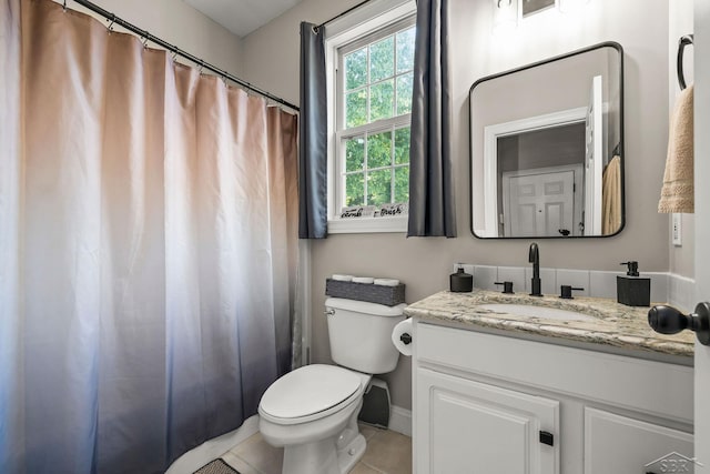 12449 Northway Pkwy, Freeland, MI 48623 - full bathroom featuring vanity, tile patterned flooring, and a shower with shower curtain