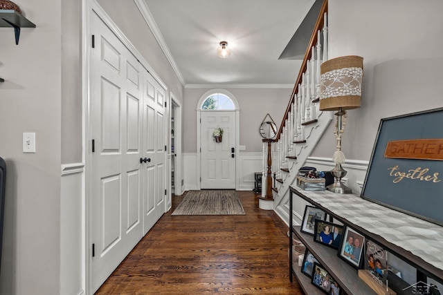 12449 Northway Pkwy, Freeland, MI 48623 - entrance foyer featuring stairs, crown molding, dark wood-style flooring, and wainscoting
