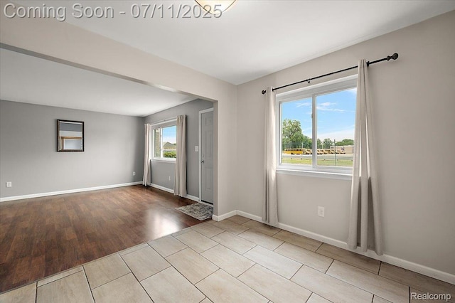 27043 Lorenz St, Madison Heights, MI 48071 - unfurnished room with baseboards and wood finished floors