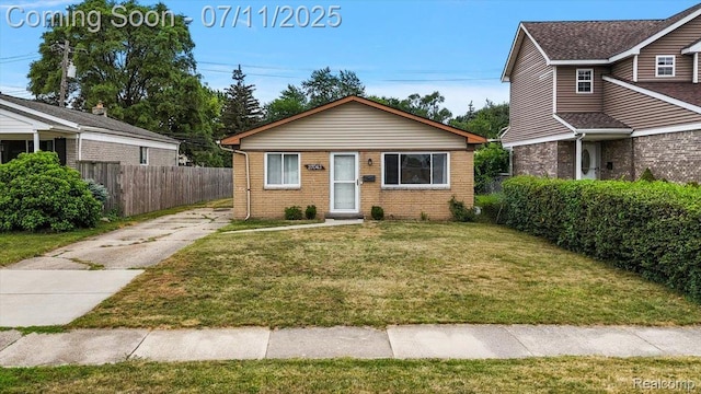 27043 Lorenz St, Madison Heights, MI 48071 - view of front of home featuring driveway and brick siding