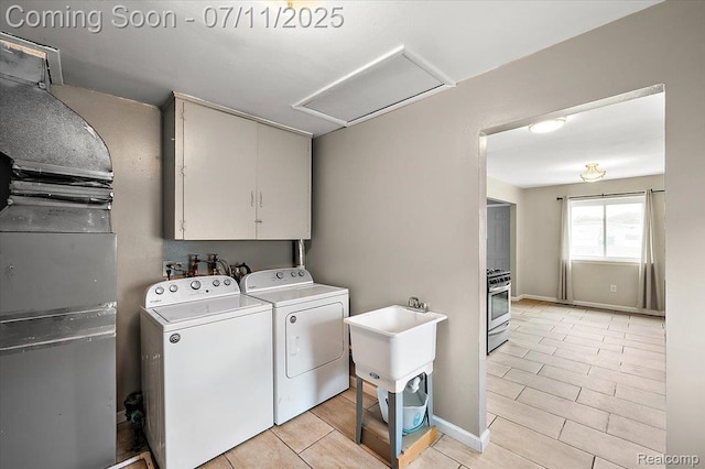 27043 Lorenz St, Madison Heights, MI 48071 - laundry room featuring independent washer and dryer, cabinet space, attic access, and light tile patterned floors