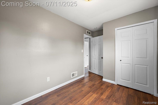27043 Lorenz St, Madison Heights, MI 48071 - unfurnished bedroom featuring dark wood-style flooring and a closet
