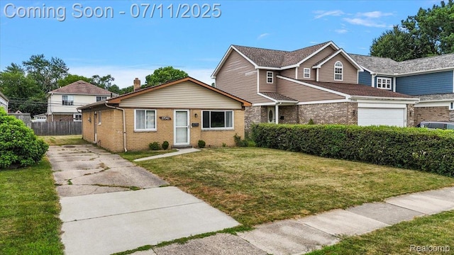 27043 Lorenz St, Madison Heights, MI 48071 - view of front of home featuring brick siding and driveway