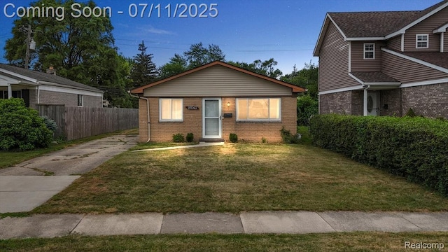 27043 Lorenz St, Madison Heights, MI 48071 - bungalow-style house with concrete driveway and brick siding
