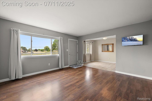 27043 Lorenz St, Madison Heights, MI 48071 - spare room with baseboards and wood finished floors