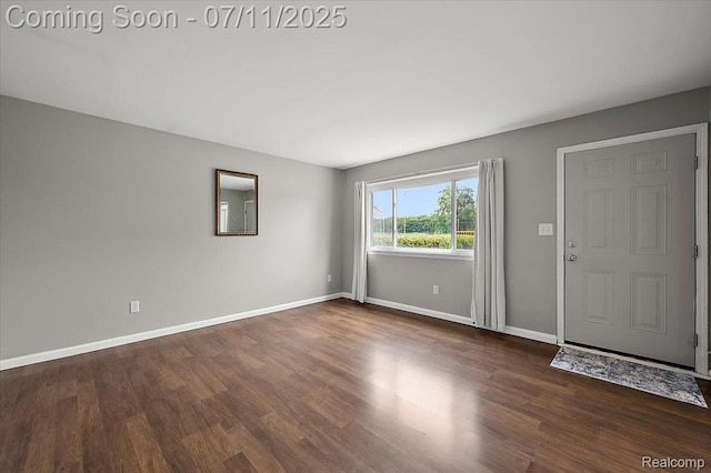 27043 Lorenz St, Madison Heights, MI 48071 - foyer featuring dark wood-style flooring and baseboards