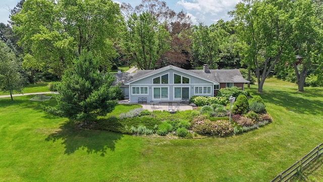 26794 Dutch Settlement St, Dowagiac, MI 49047 - back of property with a lawn and a patio area