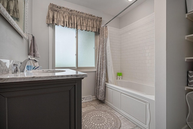 26794 Dutch Settlement St, Dowagiac, MI 49047 - bathroom featuring shower / bath combo, vanity, and tile patterned flooring