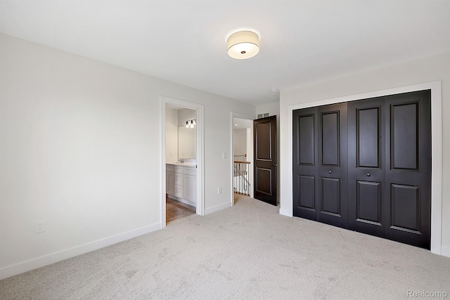 53650 Romeo Plank Rd, Macomb, MI 48042 - unfurnished bedroom with carpet flooring, a closet, and ensuite bath