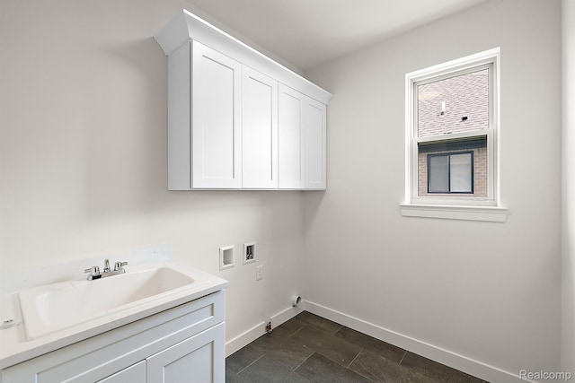 53650 Romeo Plank Rd, Macomb, MI 48042 - washroom with washer hookup, cabinet space, and hookup for a gas dryer