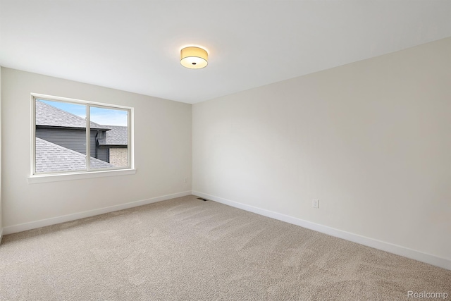 53650 Romeo Plank Rd, Macomb, MI 48042 - carpeted empty room featuring baseboards