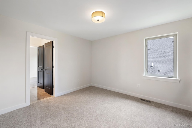 53650 Romeo Plank Rd, Macomb, MI 48042 - unfurnished room with light carpet and baseboards