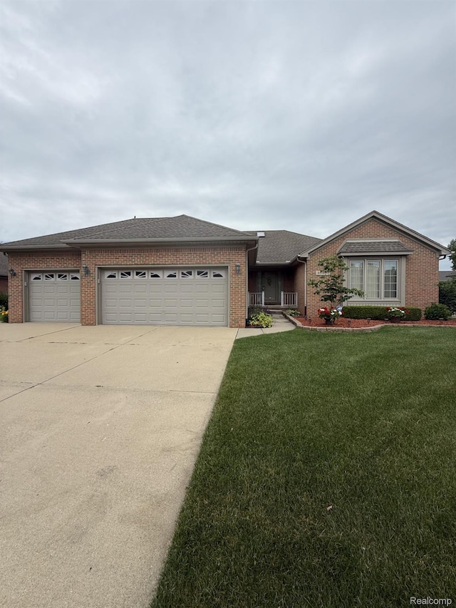 35851 Ireneus Dr, New Baltimore, MI 48047 - single story home with brick siding, an attached garage, and concrete driveway