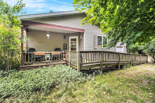 5100 Holton Duck Lake Rd, Twin Lake, MI 49457 - back of house featuring a wooden deck