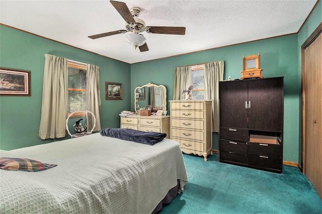 5100 Holton Duck Lake Rd, Twin Lake, MI 49457 - carpeted bedroom with multiple windows and ceiling fan