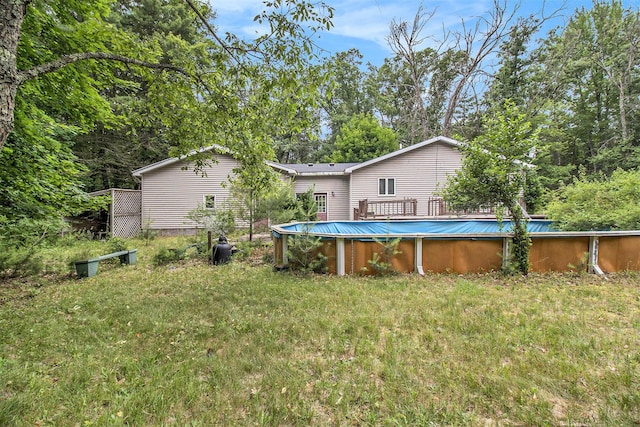5100 Holton Duck Lake Rd, Twin Lake, MI 49457 - view of grassy yard with an outdoor pool