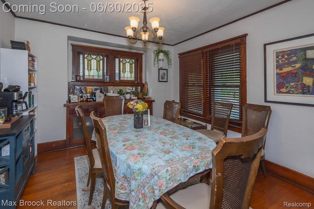464 E Cambourne St, Ferndale, MI 48220 - dining area featuring wood finished floors, a chandelier, and crown molding
