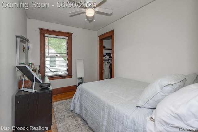 464 E Cambourne St, Ferndale, MI 48220 - bedroom with wood finished floors, ceiling fan, and a textured ceiling
