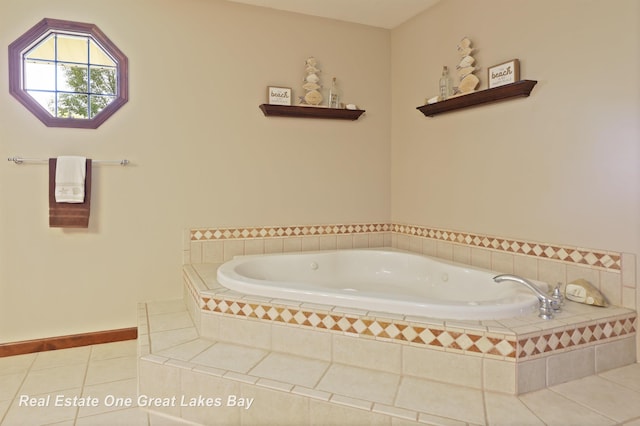 2165 Augsburg Dr, Saginaw, MI 48603 - bathroom with tile patterned flooring and a bath