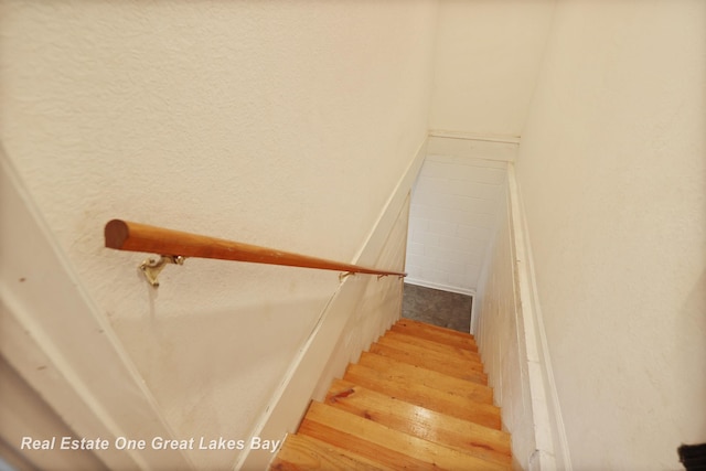 2165 Augsburg Dr, Saginaw, MI 48603 - stairway with wood finished floors