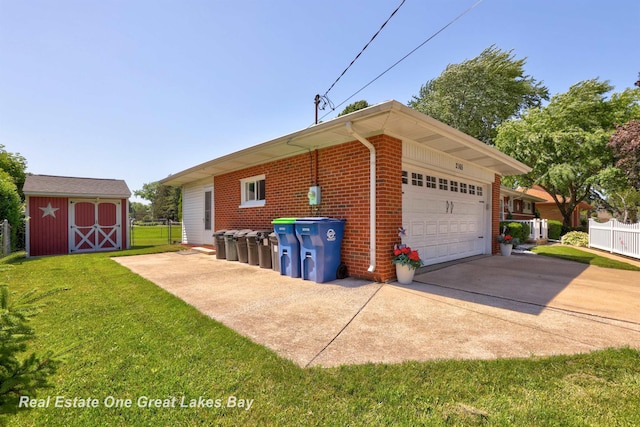 2165 Augsburg Dr, Saginaw, MI 48603 - view of home's exterior with brick siding, a garage, and a shed