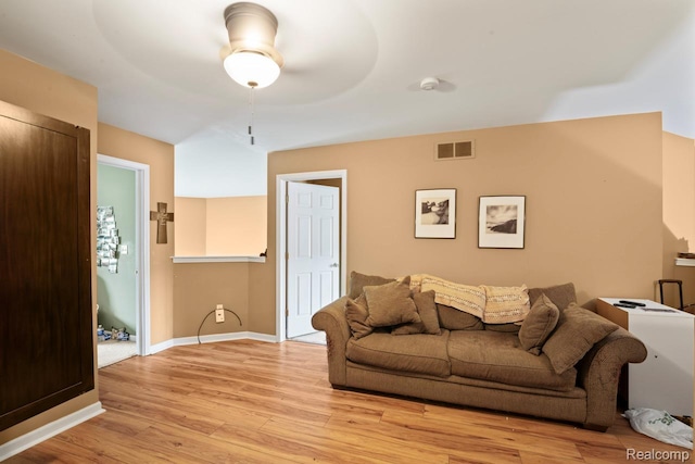 2255 Crystal Crossing Dr, Howell, MI 48843 - living area with light wood-type flooring and ceiling fan