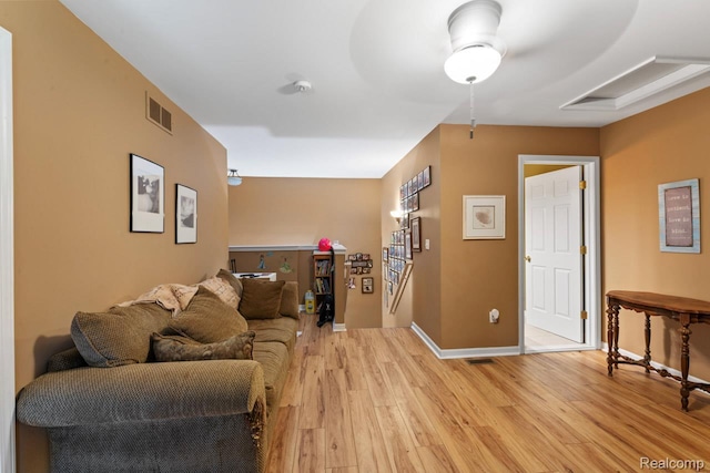 2255 Crystal Crossing Dr, Howell, MI 48843 - living room featuring light wood finished floors and baseboards