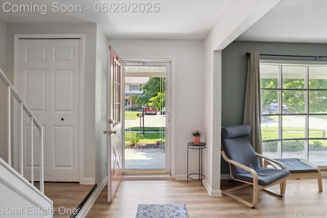 8409 Sandpiper St, Canton, MI 48187 - entryway featuring light wood-style floors and baseboards