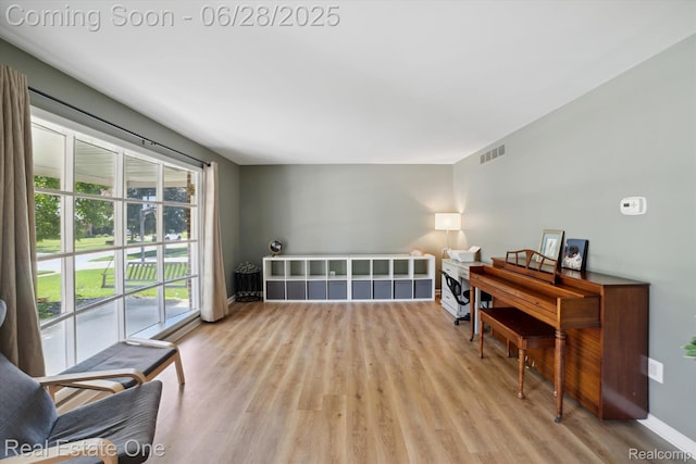 8409 Sandpiper St, Canton, MI 48187 - sitting room featuring light wood-style flooring and baseboards