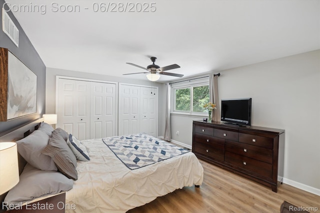 8409 Sandpiper St, Canton, MI 48187 - bedroom with multiple closets, light wood-style floors, and ceiling fan