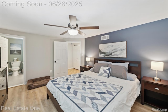8409 Sandpiper St, Canton, MI 48187 - bedroom with wood finished floors, a ceiling fan, and ensuite bathroom