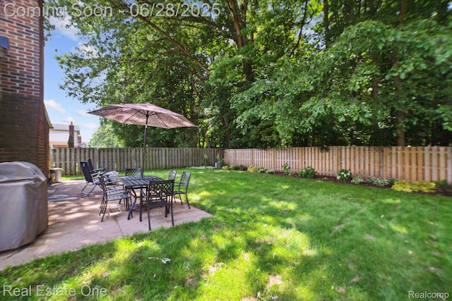 8409 Sandpiper St, Canton, MI 48187 - fenced backyard featuring a patio area