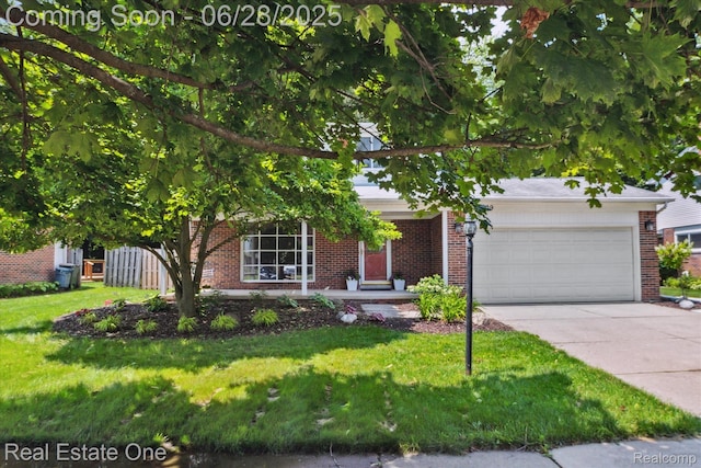 8409 Sandpiper St, Canton, MI 48187 - view of property hidden behind natural elements with brick siding, driveway, and a front yard