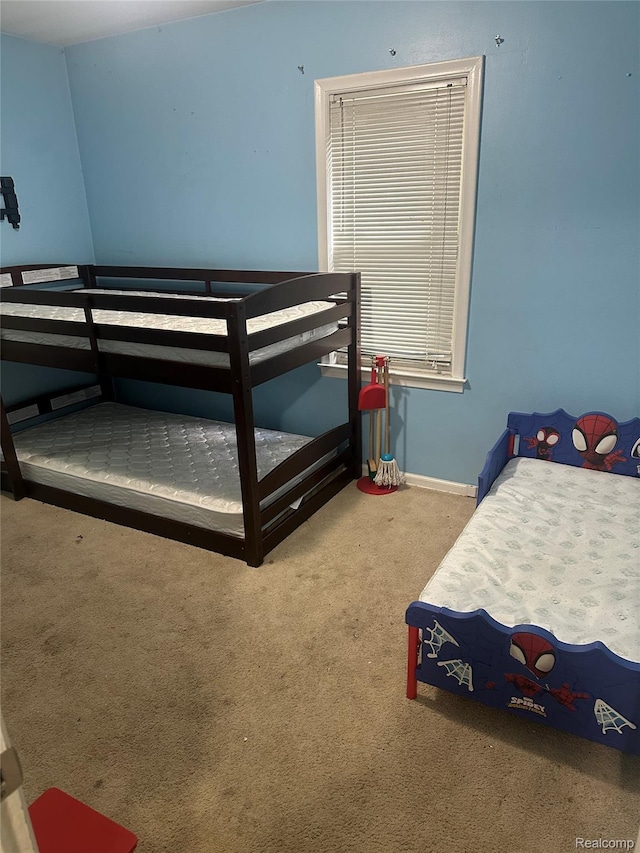 967 Hubbard Ave, Flint, MI 48503 - carpeted bedroom featuring baseboards
