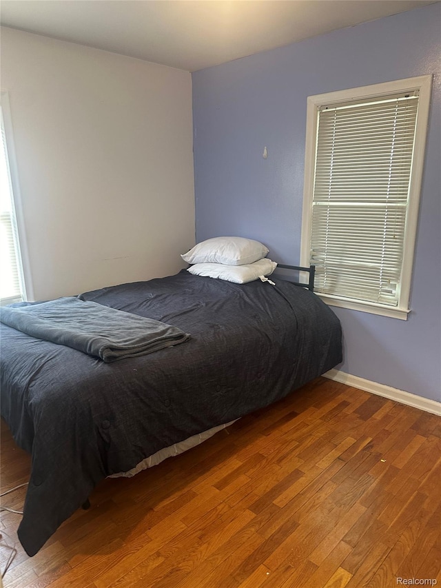 967 Hubbard Ave, Flint, MI 48503 - bedroom with wood finished floors and baseboards