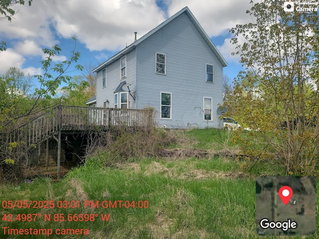 1075 12th St, Martin, MI 49070 - back of property with a deck