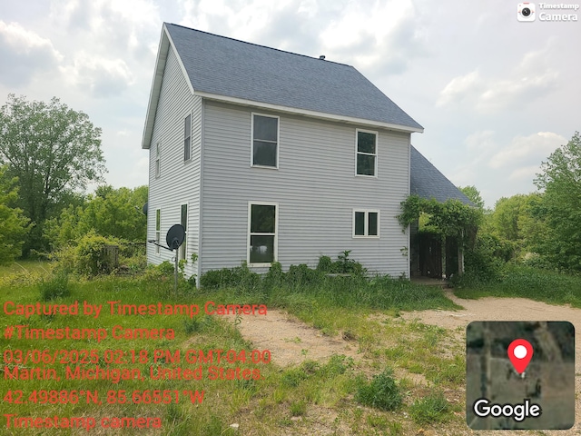 1075 12th St, Martin, MI 49070 - view of home's exterior with roof with shingles