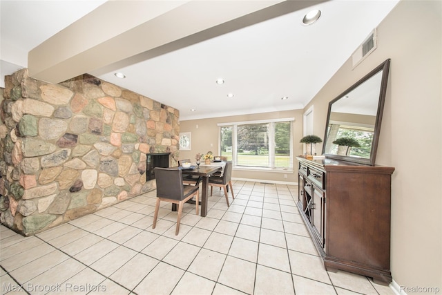 6730 Halyard Rd, Bloomfield Hills, MI 48301 - dining space featuring a fireplace, light tile patterned floors, and recessed lighting