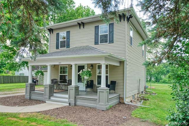 405 Garden Ln, Fowlerville, MI 48836 - view of front of house with a porch