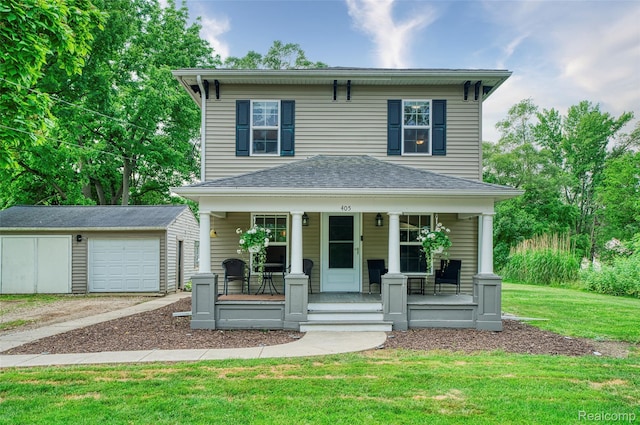 405 Garden Ln, Fowlerville, MI 48836 - view of front of house with covered porch, an outdoor structure, a front lawn, a detached garage, and driveway