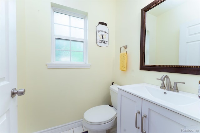 405 Garden Ln, Fowlerville, MI 48836 - bathroom featuring vanity and toilet