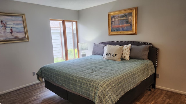 3400 Lakeside Dr S Unit 17, Petoskey, MI 49770 - bedroom with baseboards and wood finished floors
