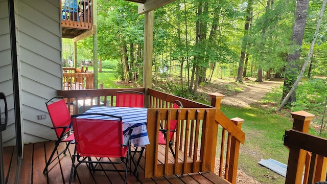 3400 Lakeside Dr S Unit 17, Petoskey, MI 49770 - wooden deck with outdoor dining space