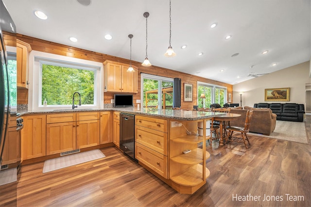 8035 Jericho Ave NE, Rockford, MI 49341 - kitchen featuring dishwasher, light wood-style flooring, a peninsula, recessed lighting, and vaulted ceiling