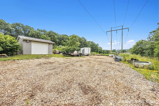 8035 Jericho Ave NE, Rockford, MI 49341 - view of yard with an outbuilding and a detached garage