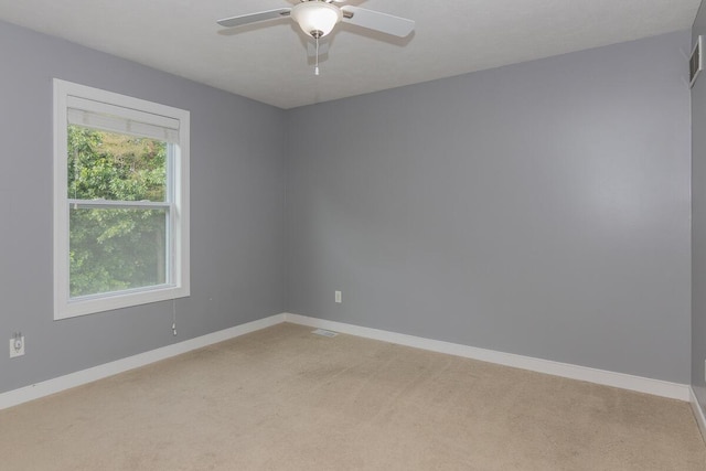 6107 Equestrian Woods Ct, Kalamazoo, MI 49009 - empty room featuring light colored carpet and ceiling fan