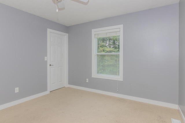 6107 Equestrian Woods Ct, Kalamazoo, MI 49009 - empty room with a ceiling fan and light colored carpet