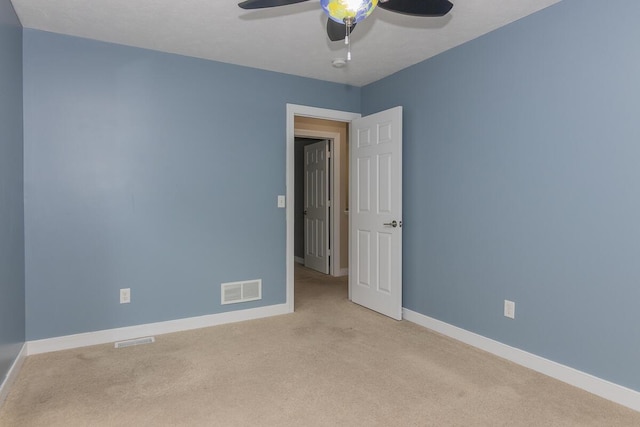 6107 Equestrian Woods Ct, Kalamazoo, MI 49009 - empty room with carpet floors and a ceiling fan
