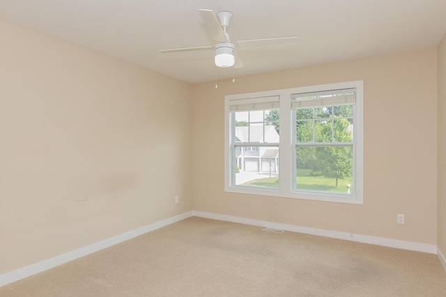 6107 Equestrian Woods Ct, Kalamazoo, MI 49009 - spare room featuring light colored carpet and ceiling fan